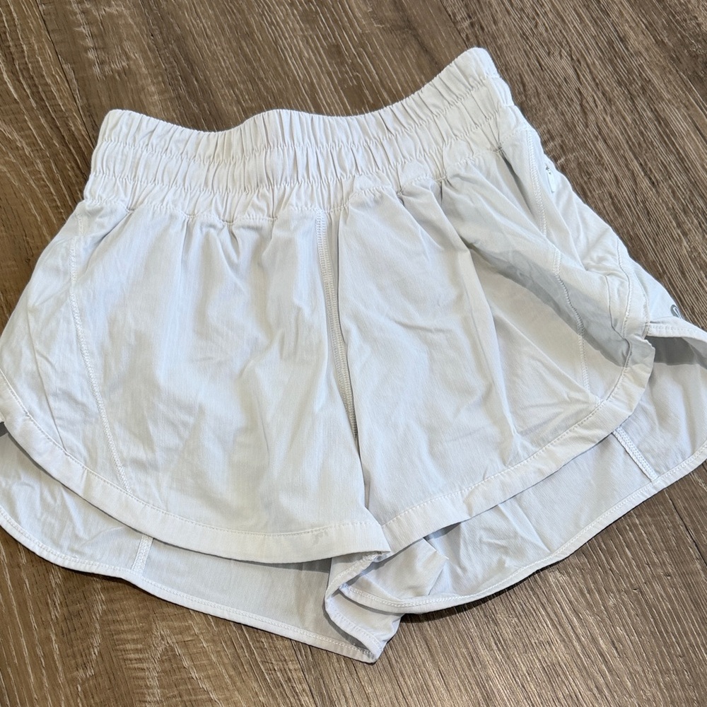 White Lululemon track that shorts